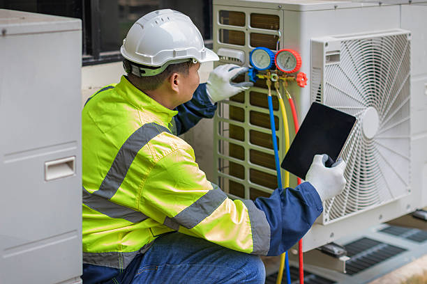 Professional Air Conditioning Repair technician working in Akron, CO